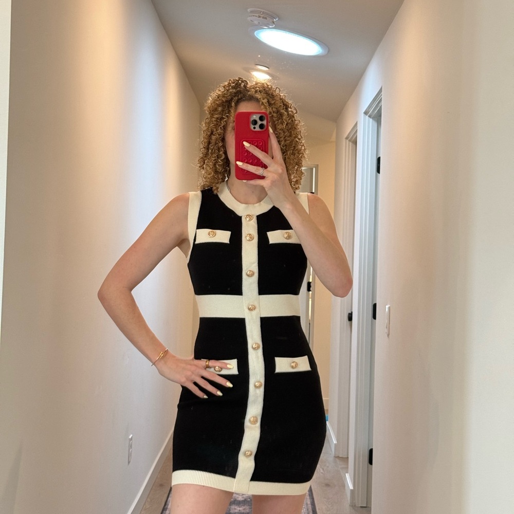 Elegant Black and Cream Sleeveless Dress